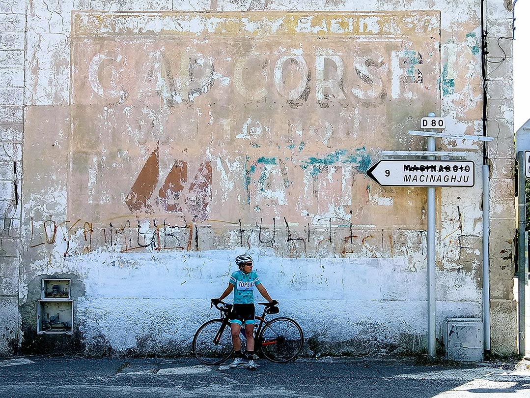 Liv (Olivia Gollan) waiting for the riders to arrive. Topbike Tour of Corsica 2018